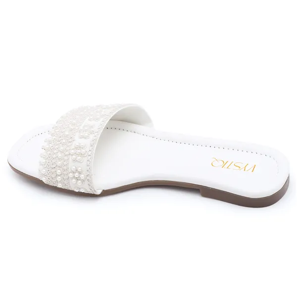Elegant_slip-on_sandals_with_pearl-studded,_soft_padded_insole,_and_large_decorative_front.