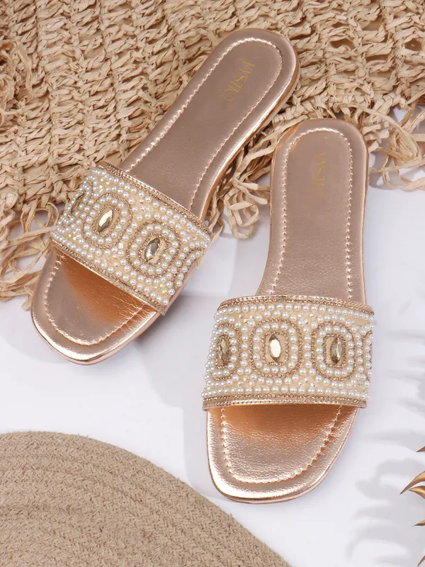 These_flat_slide_sandals_feature_a_metallic_bronze_finish_on_the_footbed_and_sole