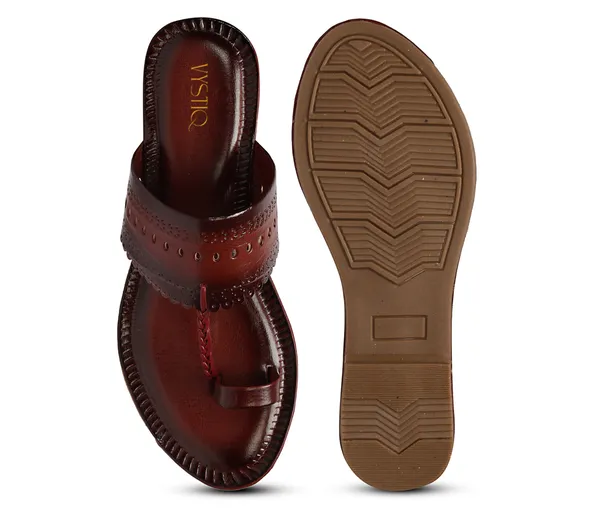 A_pair_of_stylish_women�s_slip-on_loafers_in_a_warm_tan/brown_color_with_a_subtle_ribbed_texture.