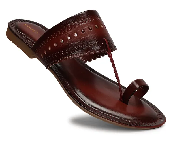 A_pair_of_stylish_women�s_slip-on_loafers_in_a_warm_tan/brown_color_with_a_subtle_ribbed_texture.
