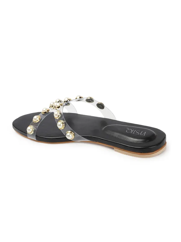 Elegant_slip-on_sandals_with_pearl-studded_V-strap,_soft_padded_insole,_and_large_decorative_front.