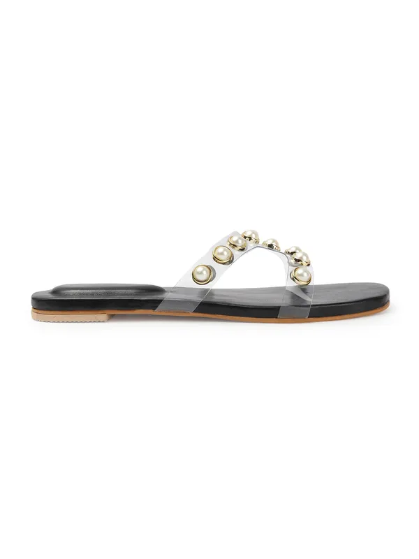 Elegant_slip-on_sandals_with_pearl-studded_V-strap,_soft_padded_insole,_and_large_decorative_front.
