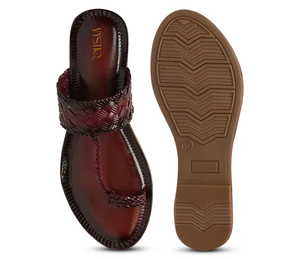 A_pair_of_stylish_women�s_slip-on_loafers_in_a_warm_tan/brown_color_with_a_subtle_ribbed_texture.