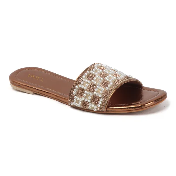 These_flat_slide_sandals_feature_a_metallic_bronze_finish_on_the_footbed_and_sole
