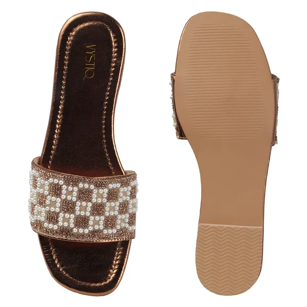 These_flat_slide_sandals_feature_a_metallic_bronze_finish_on_the_footbed_and_sole