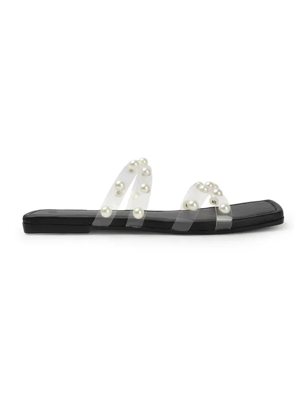 Elegant_slip-on_sandals_with_pearl-studded,_soft_padded_insole,_and_large_decorative_front.