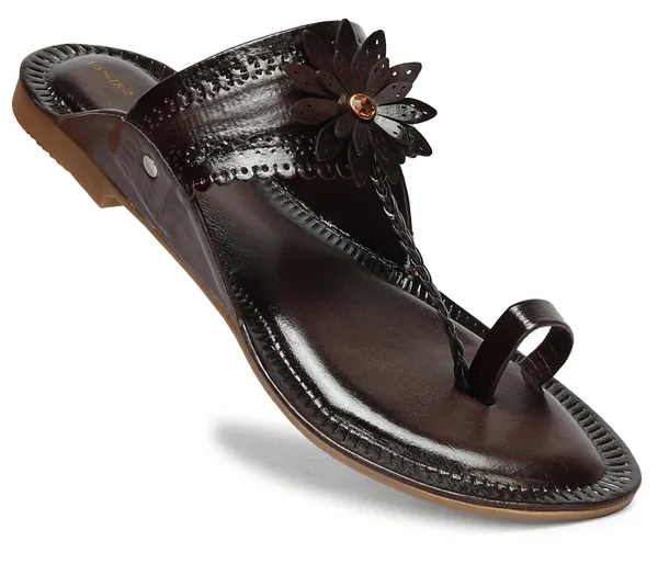 A_pair_of_stylish_women�s_slip-on_loafers_in_a_warm_tan/brown_color_with_a_subtle_ribbed_texture.