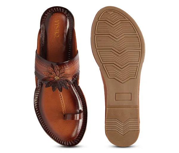 A_pair_of_stylish_women�s_slip-on_loafers_in_a_warm_tan/brown_color_with_a_subtle_ribbed_texture.