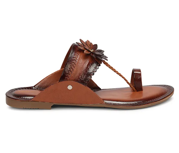 A_pair_of_stylish_women�s_slip-on_loafers_in_a_warm_tan/brown_color_with_a_subtle_ribbed_texture.
