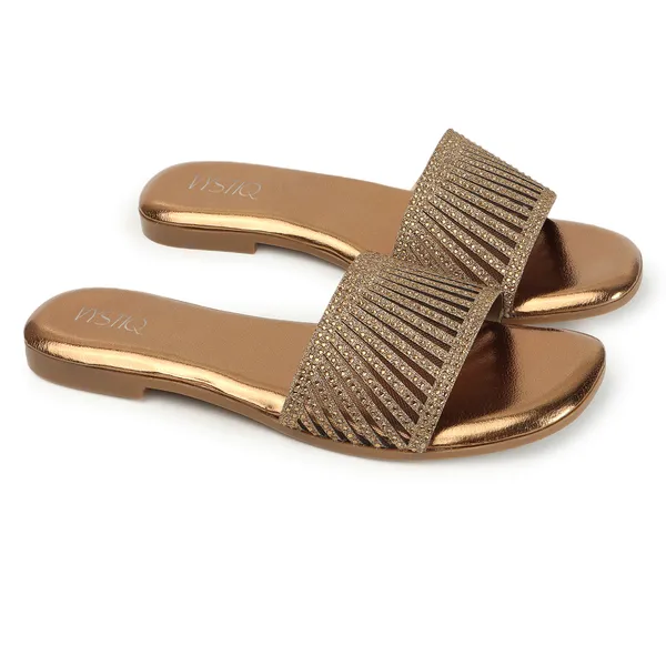 Elegant_slip-on_sandals_with_pearl-studded,_soft_padded_insole,_and_large_decorative_front.