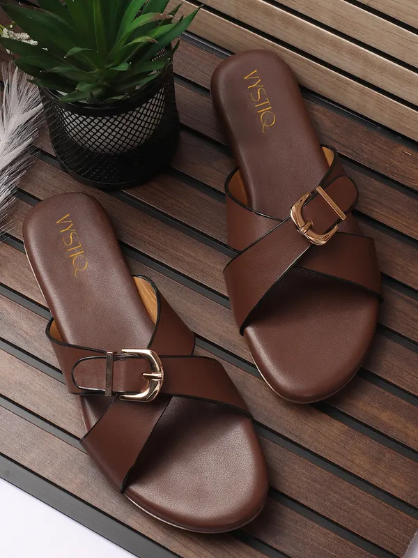 Women_Flat_SandalElegant_slip-on_sandals_with_pearl-studded_V-strap,_soft_padded_insole,_and_large_decorative_front.s