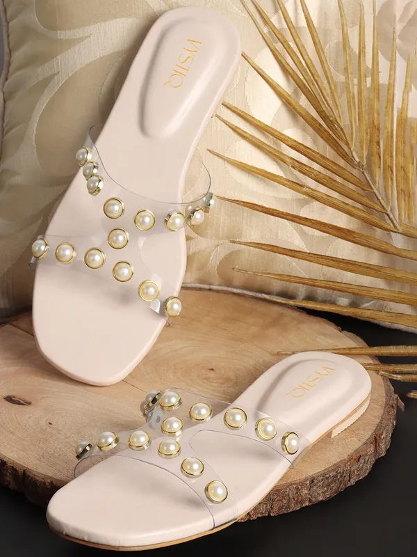 Elegant_slip-on_sandals_with_pearl-studded_soft_padded_insole,_and_large_decorative_front.