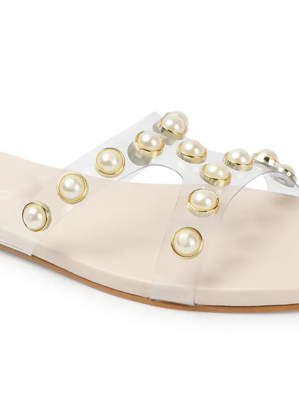 Elegant_slip-on_sandals_with_pearl-studded_soft_padded_insole,_and_large_decorative_front.