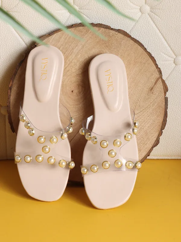 Elegant_slip-on_sandals_with_pearl-studded_soft_padded_insole,_and_large_decorative_front.