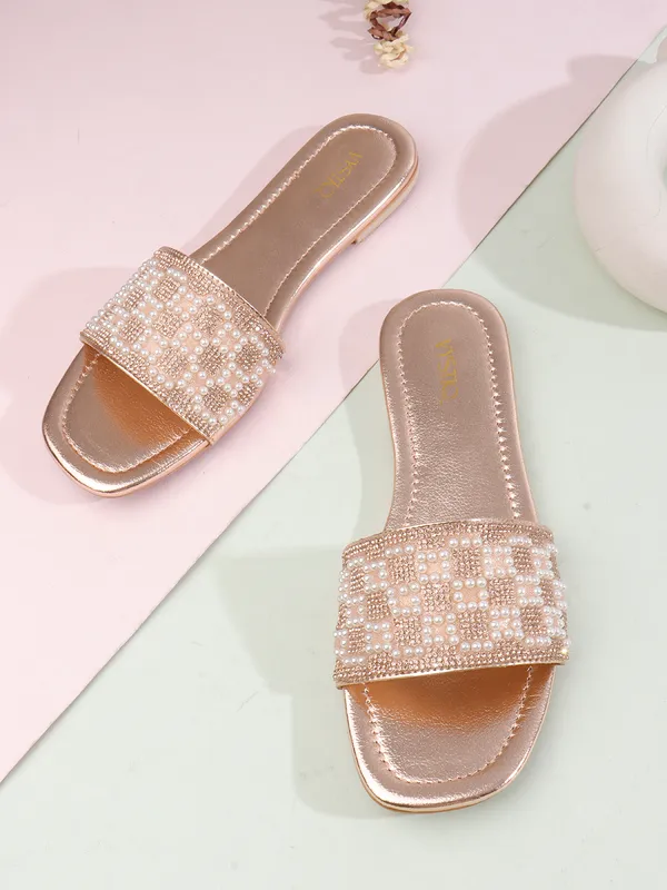 These_flat_slide_sandals_feature_a_metallic_bronze_finish_on_the_footbed_and_sole