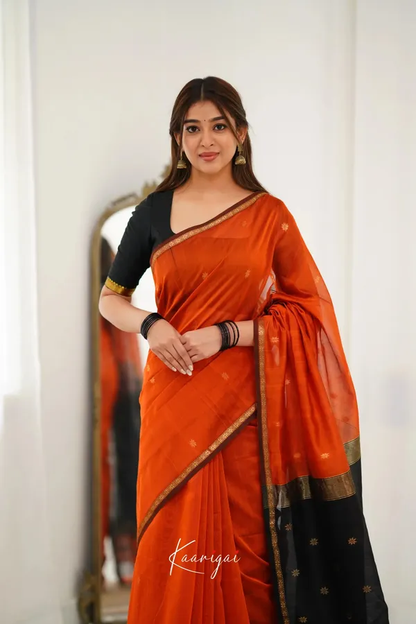 Orange_and_Black_Kanjivaram_Silk_Saree_with_Golden_Zari_Buttas_&_Contrast_Maroon_Pallu