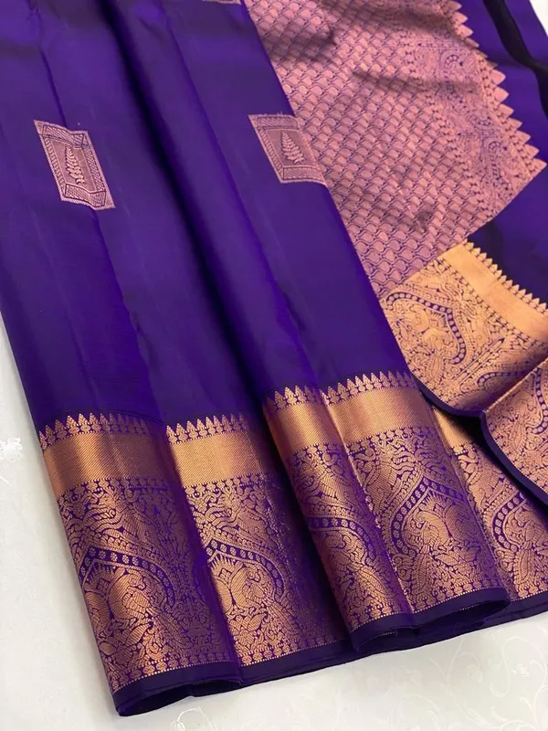Blue_Kanjivaram_Silk_Saree_with_Copper_Zari_Peacock_Motifs_and_Temple_Border