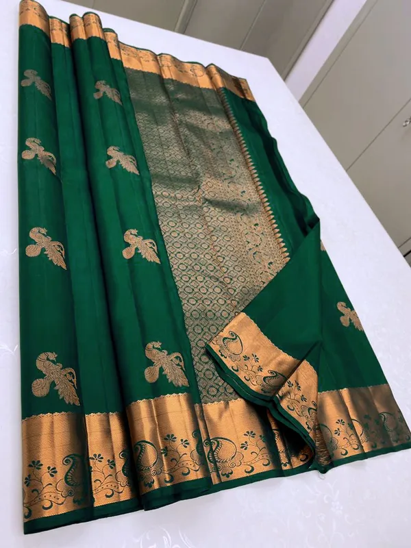 Green_Banarasi_Silk_Saree_with_Mor_Weaving_&_Traditional_Broad_Border