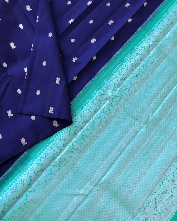 Dark_Blue_Kanjivaram_Silk_Saree_with_Silver_Zari_Buttas_&_Contrast_Green_Border_-_Blouse_Piece_Included