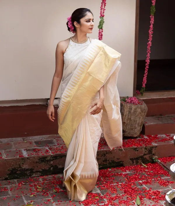 White_Banarasi_Silk_Saree_with_Golden_Zari_Paisley_Design