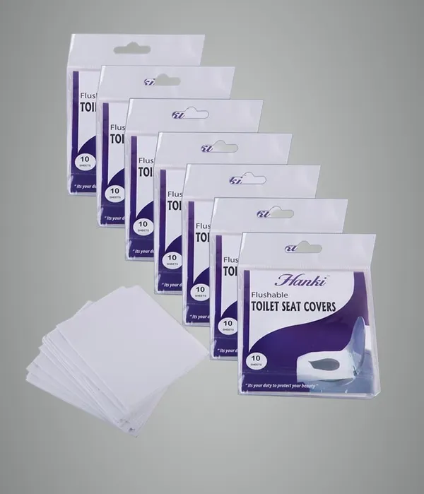 White_Flushable_Paper_Toilet_Seat_Covers_To_Use_In_Public_Toilets_And_Restrooms_Pack_Of_70_Sheets