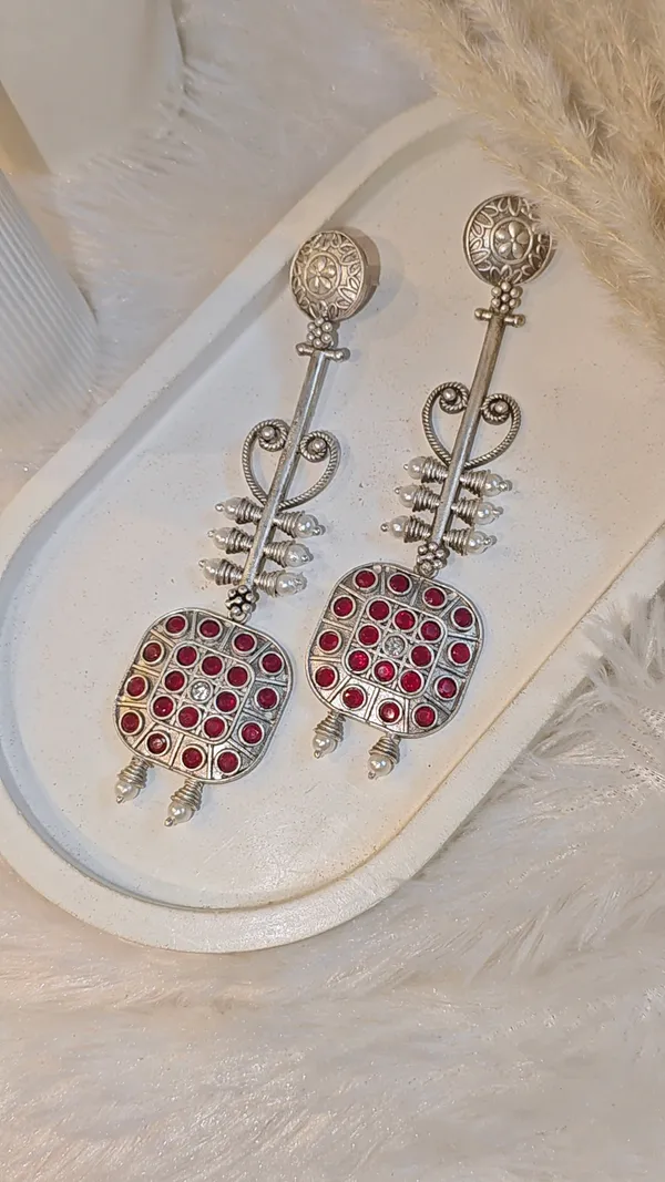 ANTIQUE_SILVER_LONG_DANGLER_EARRINGS_WITH_RED_STONE_WORK
