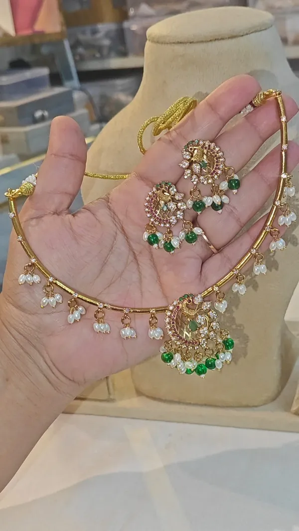 SHILPI_PEACOCK_-_GOLDEN_(AD_DIAMONDS)_HASLI_SET_FOR_WOMEN