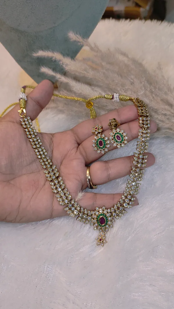 CLASSIC_PARVATHI_GOLD-PLATED_NECKLACE_SET_WITH_RUBY_&_EMERALD_ACCENTS
