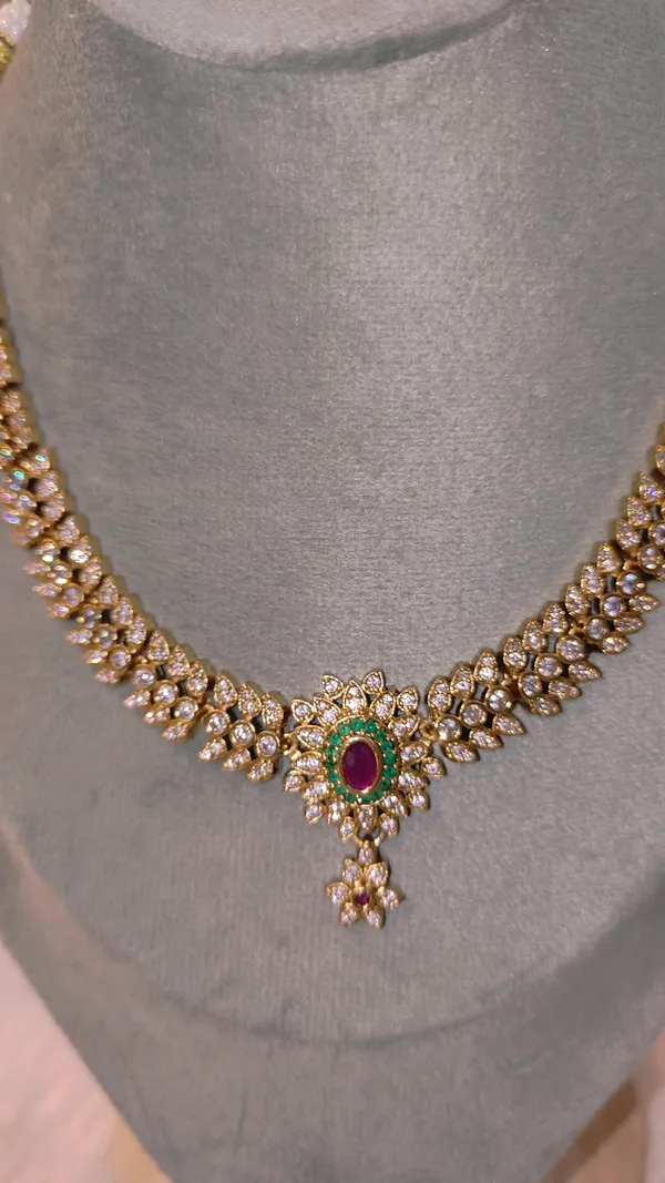 CLASSIC_PARVATHI_GOLD-PLATED_NECKLACE_SET_WITH_RUBY_&_EMERALD_ACCENTS