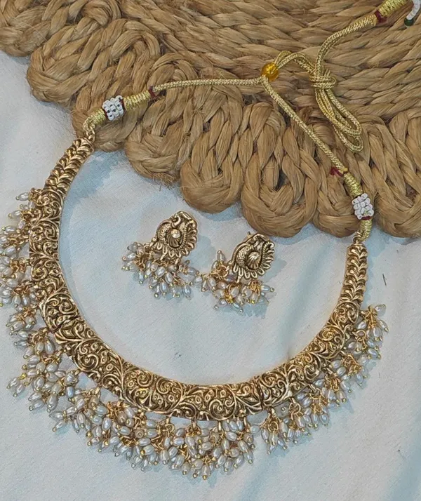 RAINA_TRADITIONAL_GOLD-TONED_TEMPLE_NECKLACE_SET_WITH_PEARL_DROPS