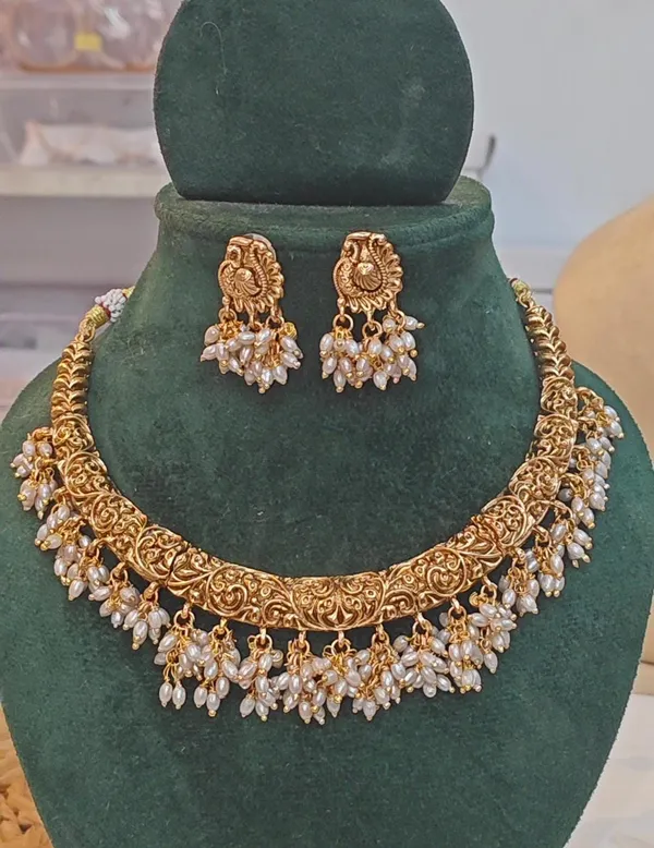 RAINA_TRADITIONAL_GOLD-TONED_TEMPLE_NECKLACE_SET_WITH_PEARL_DROPS