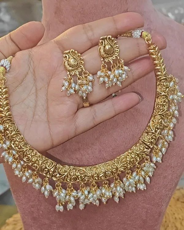 RAINA_TRADITIONAL_GOLD-TONED_TEMPLE_NECKLACE_SET_WITH_PEARL_DROPS