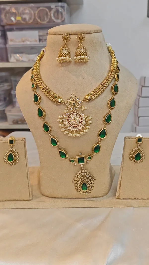 SURBHI_-_COMBO_EMERALD_GREEN_AND_GOLDEN_NECKLACE_SET
