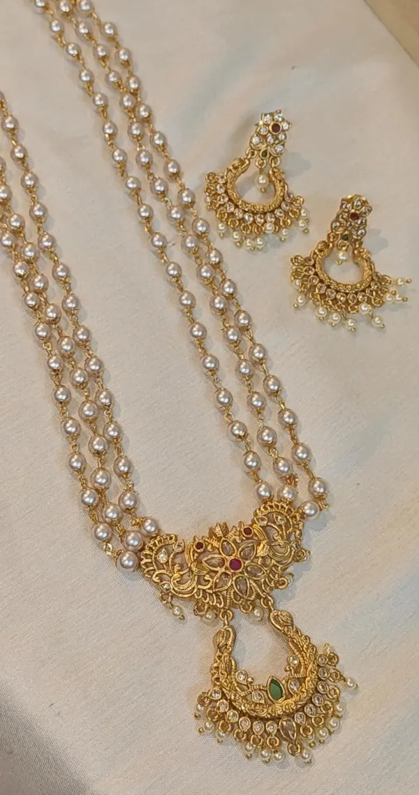 VASUDHA_-_ELEGANT_PEARL_LAYERED_NECKLACE_SET_WITH_DESIGNER_PENDANT