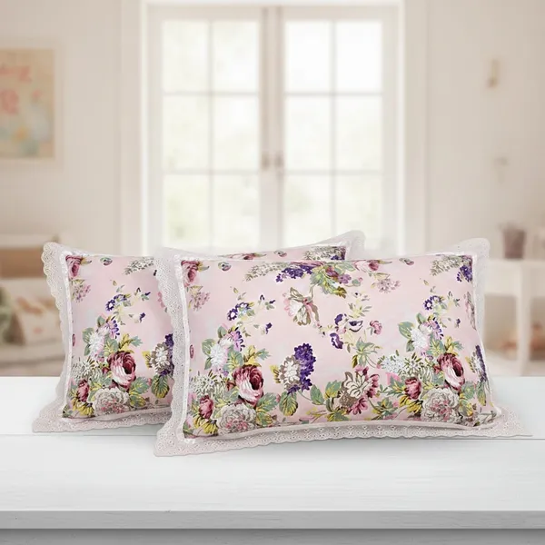 Exquisite_floral_bloom_on_light_pink_on_premium_cotton_bedsheet_and_two_pillow_covers_decorated_with_double_lace