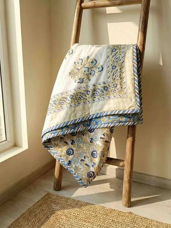 Exquisite_pure_cotton_mulmul_pair_of_single_handblock_dohars_with_inner_layer_in_flannel_in_beautiful_blue_and_yellow_on_white
