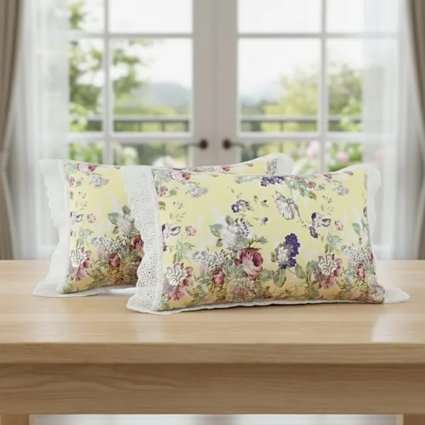 Exquisite_floral_bloom_on_light_yellow_on_premium_cotton_bedsheet_and_two_pillow_covers_decorated_with_double_lace