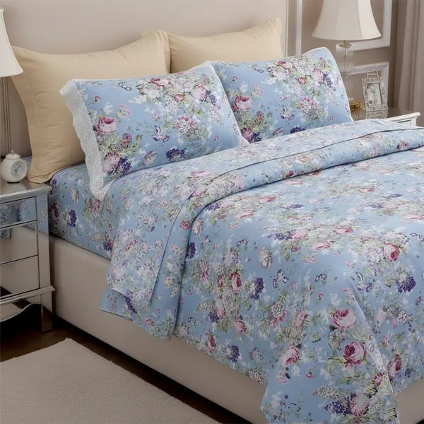 Exquisite_floral_bloom_on_light_blue_on_premium_cotton_bedsheet_and_two_pillow_covers_decorated_with_double_lace