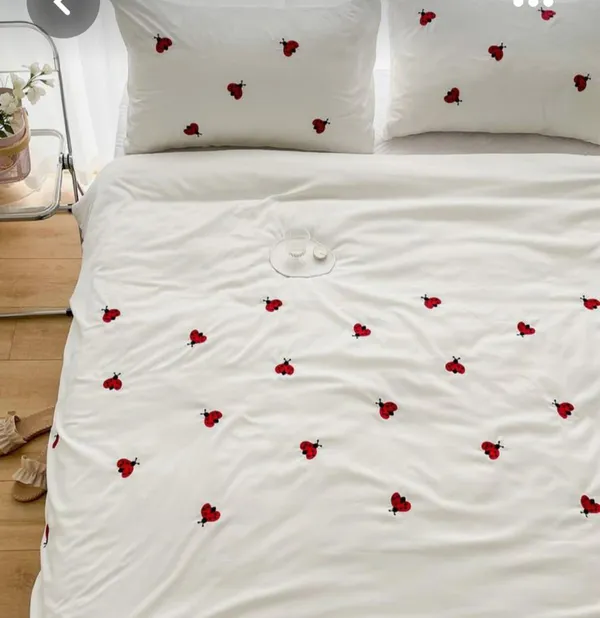 Exquisite_embroidered_bedsheet_with_red_ladybug_pattern_on_white_in_premium_cotton_bedsheet_along_with_two_pillow_covers