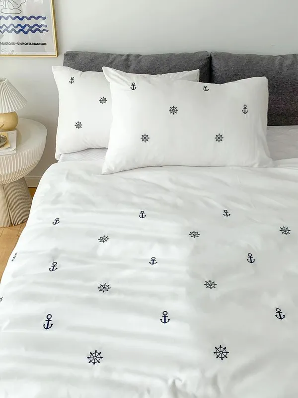 Exquisite_embroidered_bedsheet_with_grey_anchor_and_ship_wheel_pattern_on_white_in_premium_cotton_bedsheet_with_two_pillow_covers
