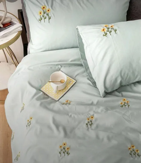 Exquisite_embroidered_bedsheet_in_triple_flower_pattern_in_yellow_on_green_premium_cotton_bedsheet_with_two_pillow_covers