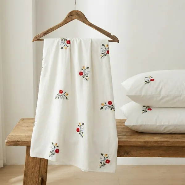 Exquisite_Embroidered_Bedsheet_With_Red_And_Yellow_Flowers_On_White_In_Premium_Cotton_Bedsheet_Along_With_Two_Pillow_Covers