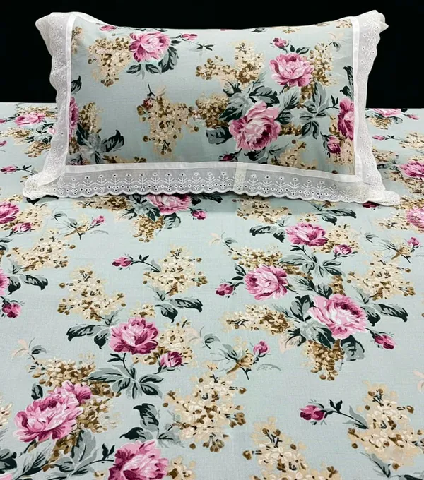 Exquisite_floral_print_in_pink_on_green_pure_cotton_double_bedsheet_and_two_pillow_covers_decorated_with_beautiful_double_lace