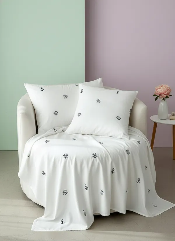 Exquisite_embroidered_bedsheet_with_grey_anchor_and_ship_wheel_pattern_on_white_in_premium_cotton_bedsheet_with_two_pillow_covers