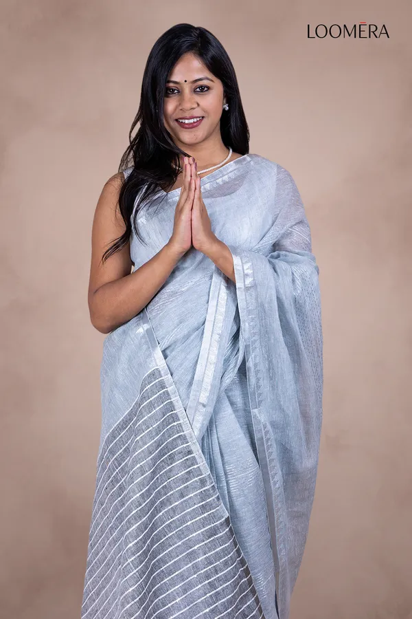 Grey_Linen_Saree_With_Sequin_Work_And_Silver_Zari_Border