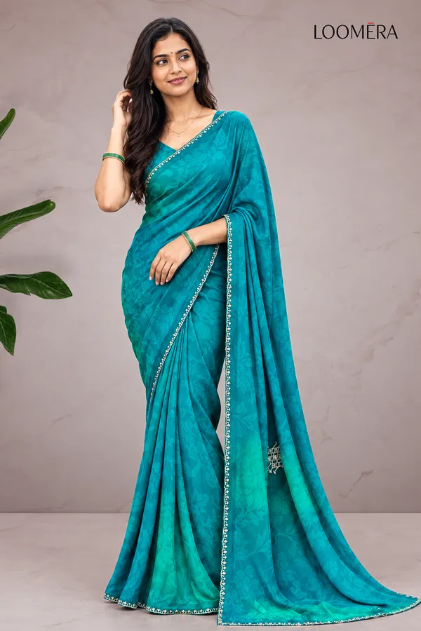 Teal_Blue_Georgette_Saree_with_Floral_Design
