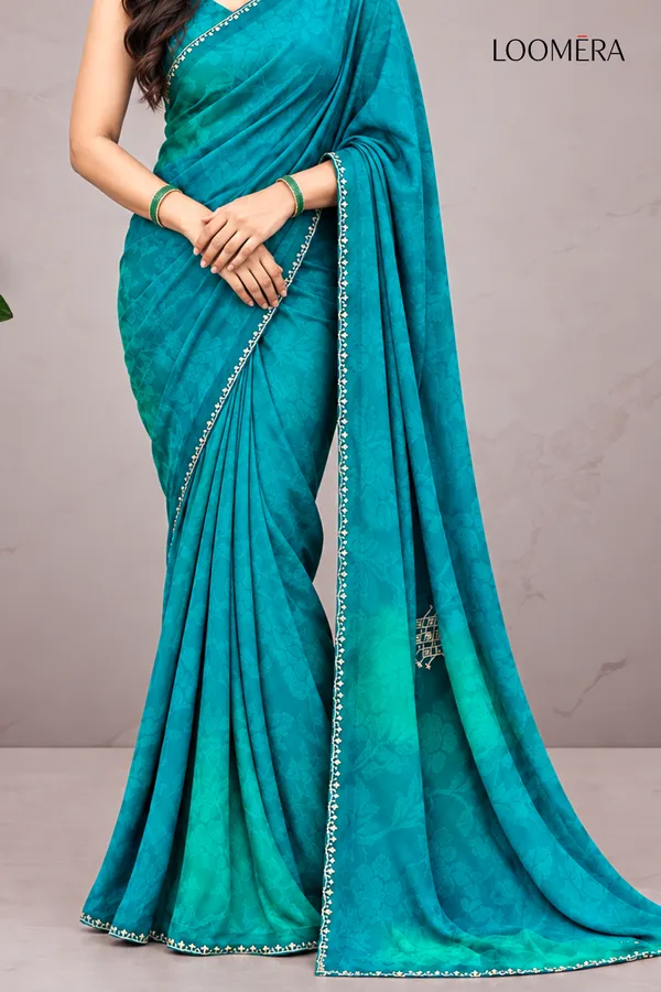 Teal_Blue_Georgette_Saree_with_Floral_Design