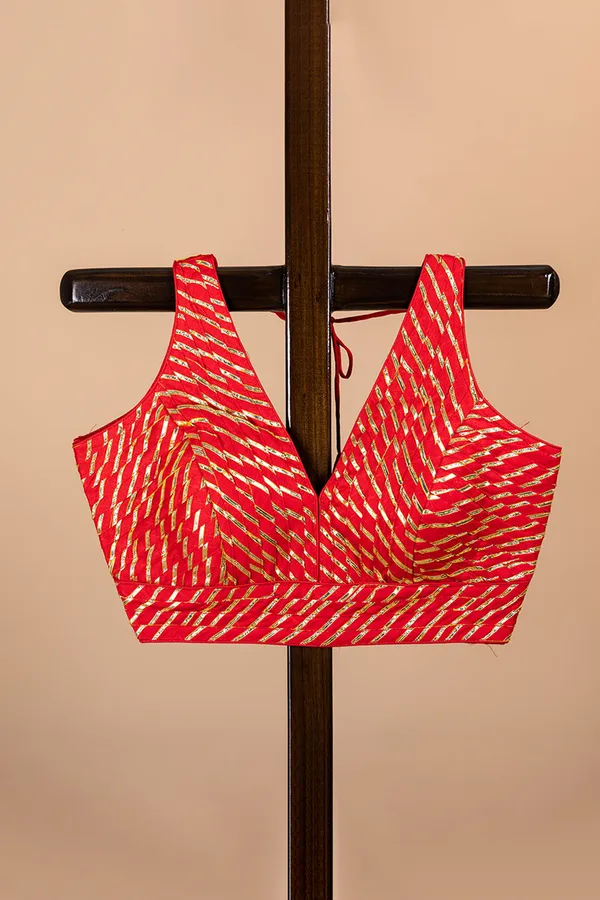 Red_Blouse_With_V_Neck_And_Golden_Zari_Work