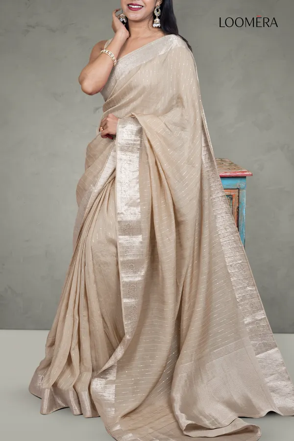 Beige_Sequined_Line_Saree_With_Floral_Zari_Border