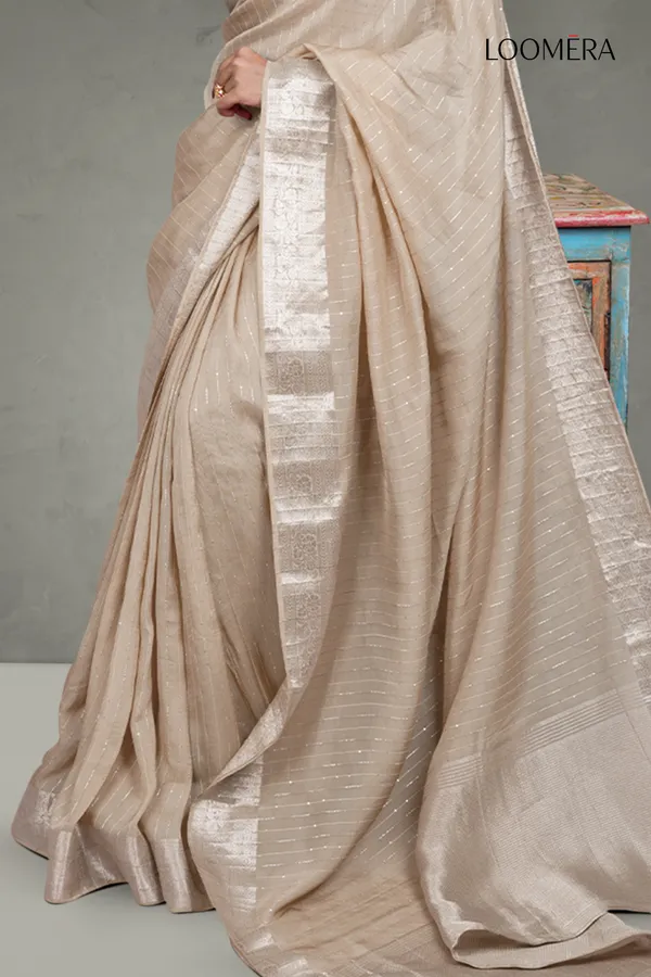 Beige_Sequined_Line_Saree_With_Floral_Zari_Border